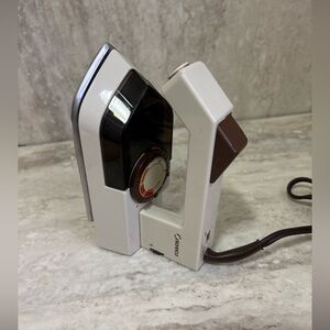 Vintage Norelco TI70 Travel Clothes Iron Spray Steam Dry Folding Handle  Works!